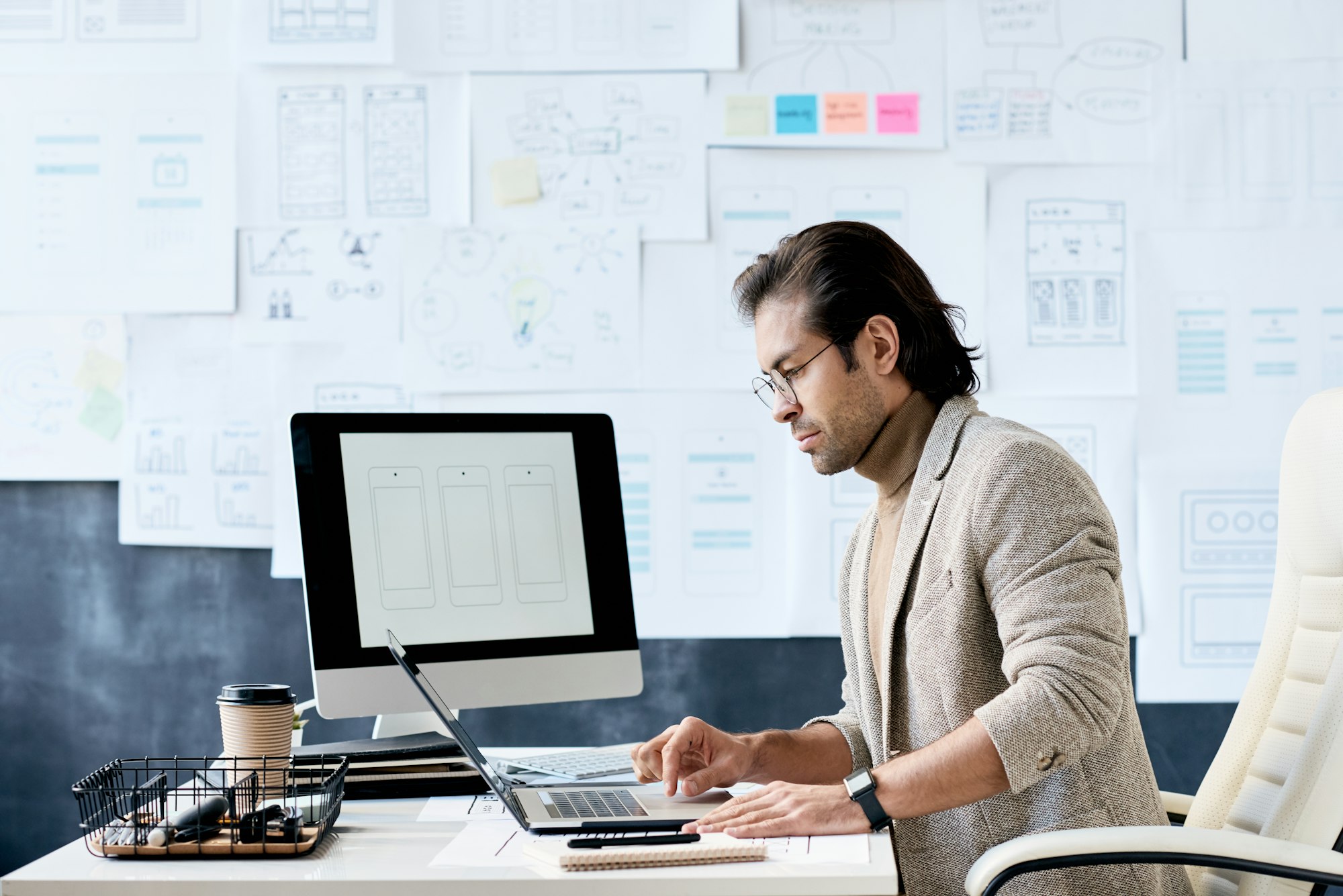 Manager of app design company in office